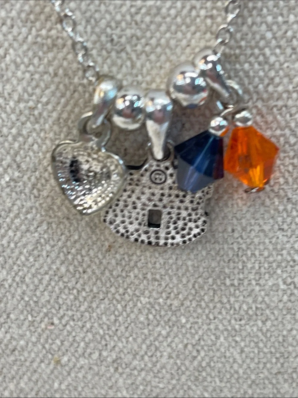 Auburn collegiate silver necklace with AU pendant in blue and orange